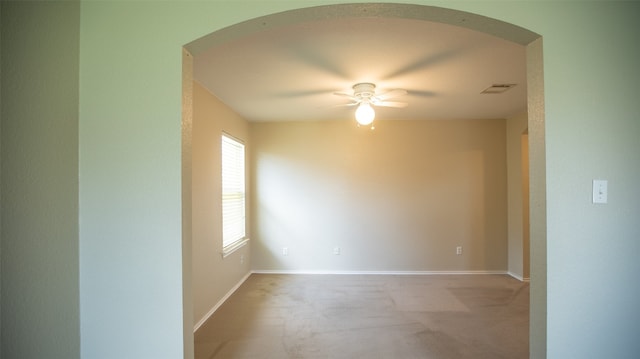 empty room featuring ceiling fan