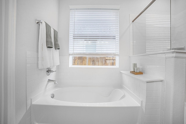 bathroom with a washtub