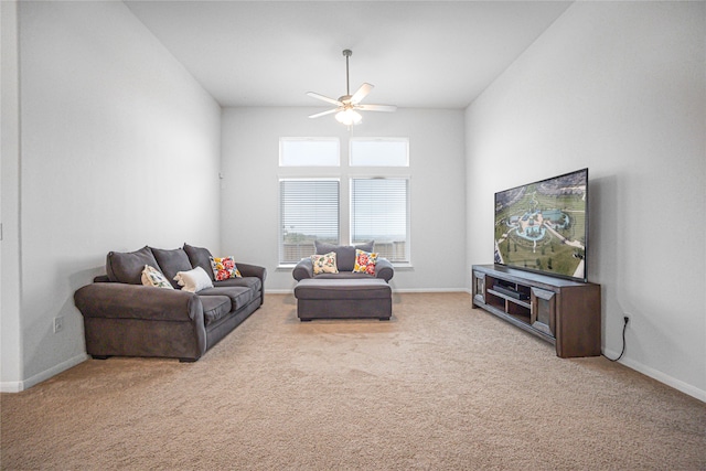 living room with light carpet and ceiling fan