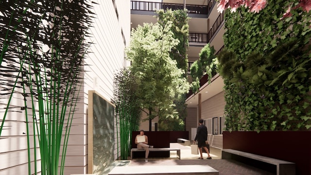 exterior space featuring outdoor lounge area and a balcony