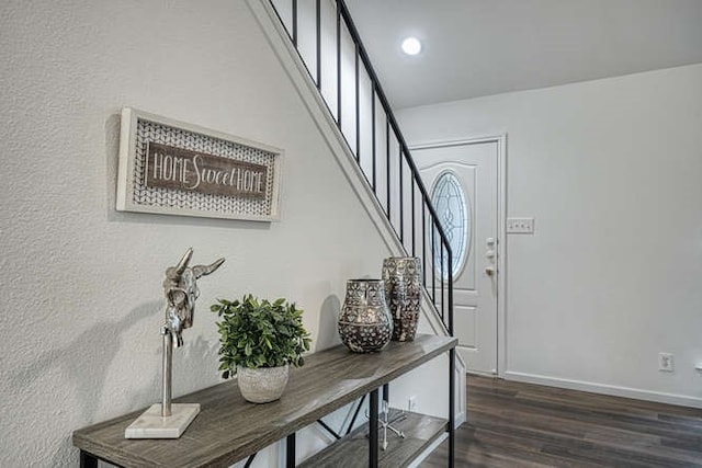 foyer featuring dark hardwood / wood-style floors