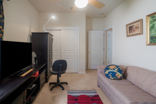 carpeted office with ceiling fan