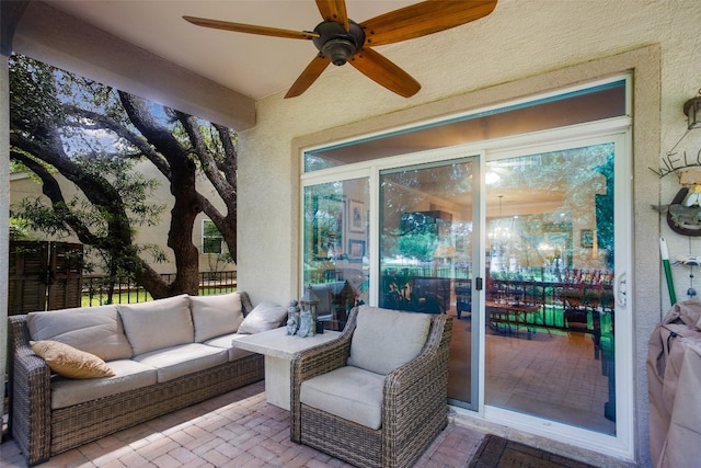 view of patio with ceiling fan