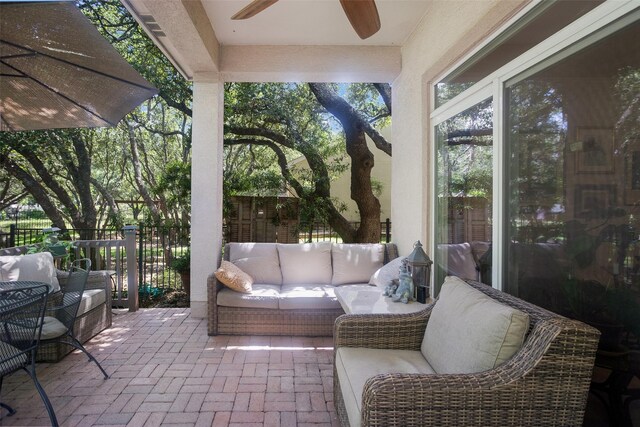 view of patio / terrace featuring outdoor lounge area and ceiling fan