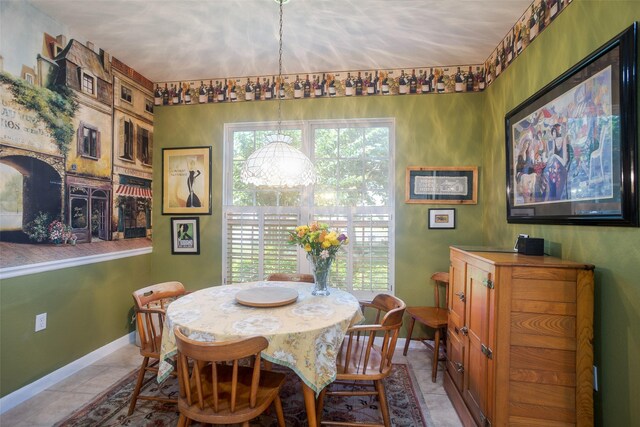 dining area with tile patterned flooring