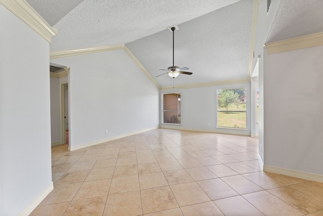 spare room featuring ornamental molding, vaulted ceiling, light tile patterned flooring, and ceiling fan