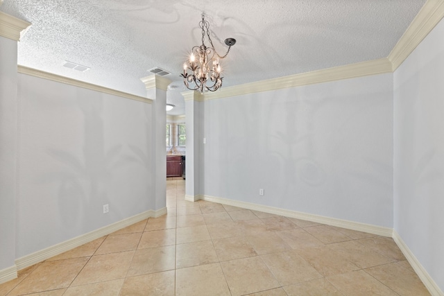 unfurnished dining area with a textured ceiling, crown molding, a chandelier, and light tile patterned floors