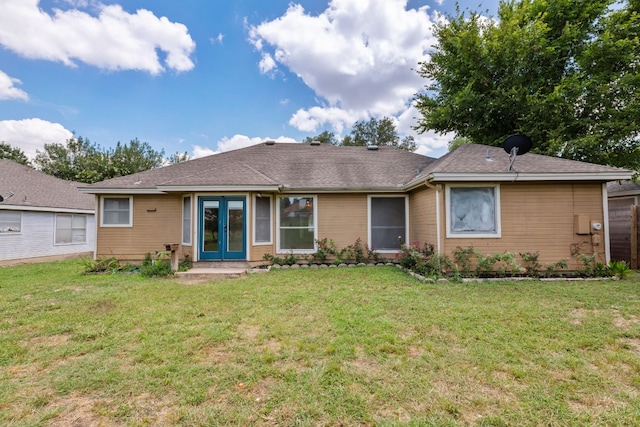 ranch-style house with a front yard