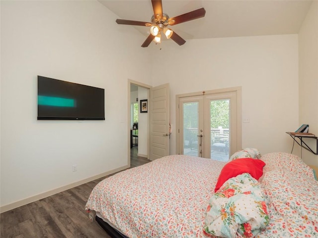 bedroom with french doors, vaulted ceiling, ceiling fan, access to exterior, and dark hardwood / wood-style flooring