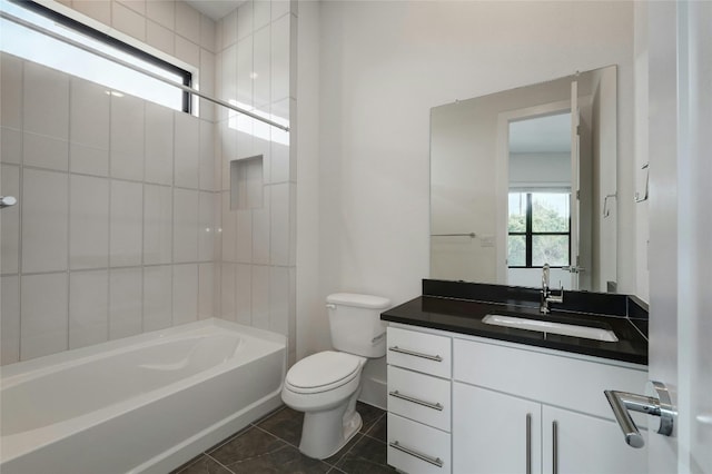 full bathroom with vanity, tile patterned floors, toilet, and bathing tub / shower combination