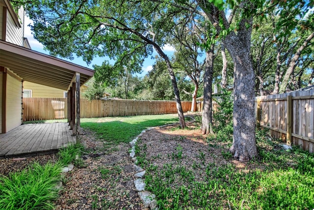 view of yard featuring a deck