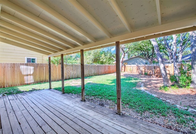 deck featuring a lawn