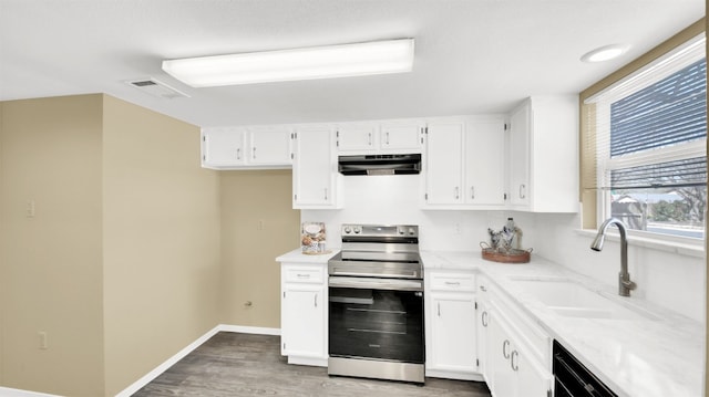12002 Hardwood Trl, Austin, TX 78750 - kitchen featuring stainless steel electric range oven, under cabinet range hood, a sink, and white cabinets