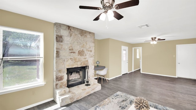 12002 Hardwood Trl, Austin, TX 78750 - living room with a ceiling fan, healthy amount of natural light, and baseboards
