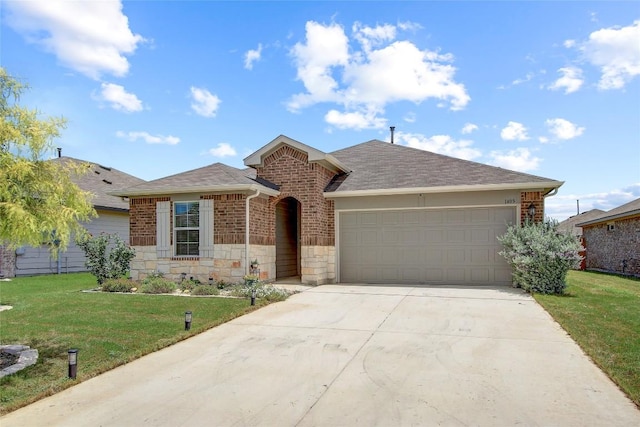 ranch-style home featuring a front yard and a garage