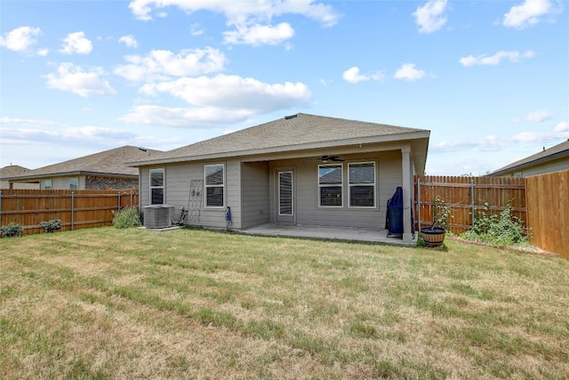 back of property featuring a yard, a patio, central AC, and ceiling fan