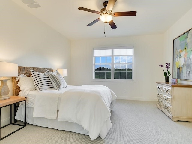 bedroom with light carpet and ceiling fan