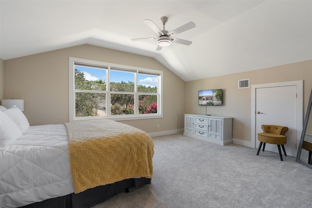 bedroom featuring lofted ceiling, carpet, and ceiling fan