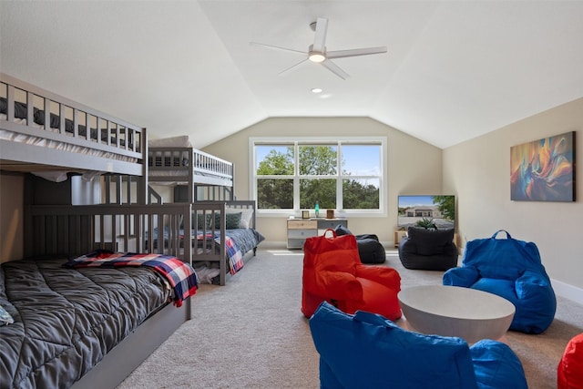 bedroom with carpet flooring, ceiling fan, and lofted ceiling