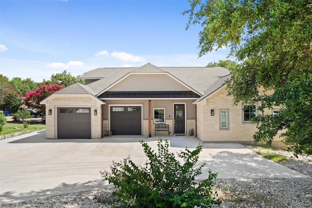 view of front of property with a garage