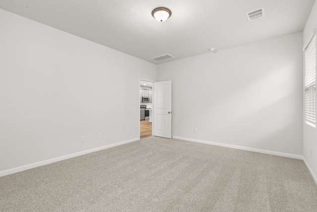 empty room with carpet floors