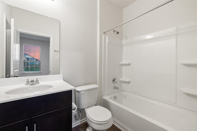 full bathroom featuring shower / bathtub combination, vanity, toilet, and hardwood / wood-style floors