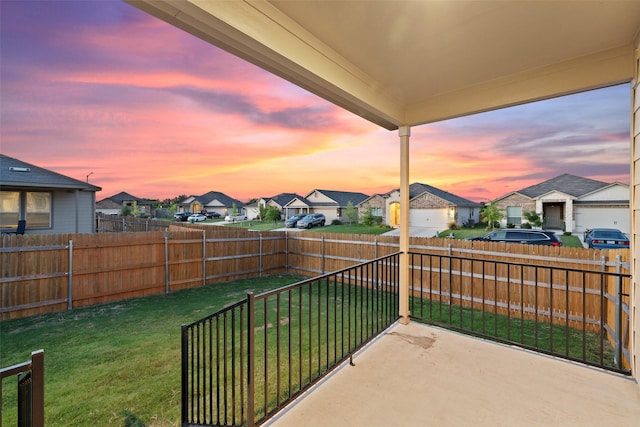 view of patio terrace at dusk