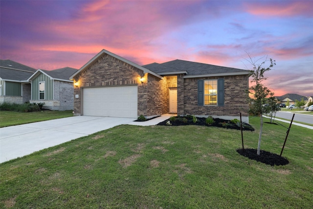 ranch-style house with a garage and a lawn