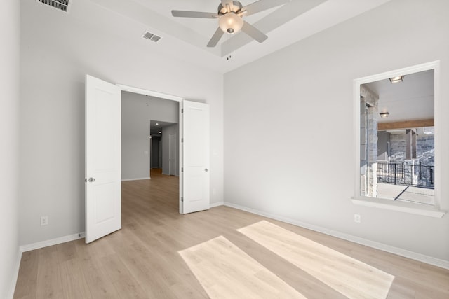 unfurnished bedroom featuring ceiling fan and light wood-type flooring