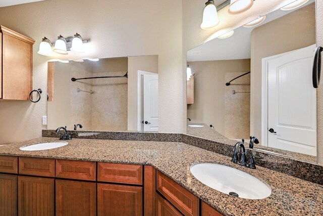 bathroom with dual bowl vanity