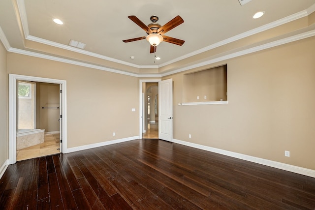 unfurnished bedroom with ensuite bathroom, recessed lighting, baseboards, ornamental molding, and hardwood / wood-style floors