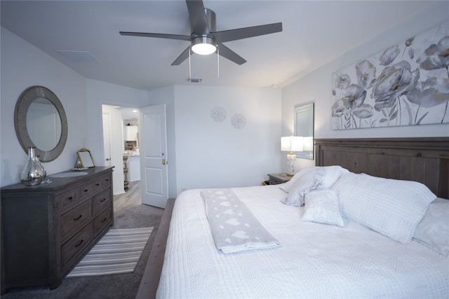 carpeted bedroom with ceiling fan