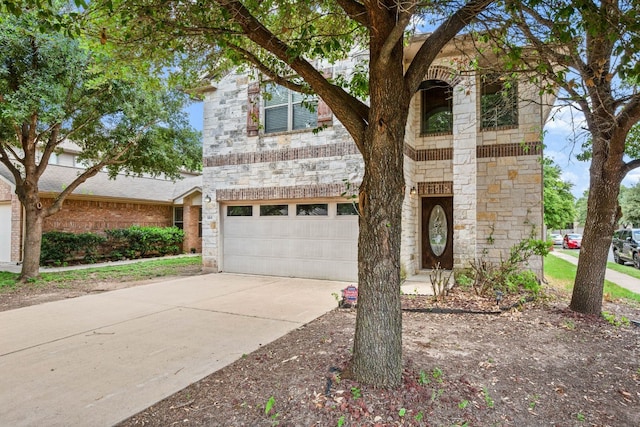 front of property with a garage