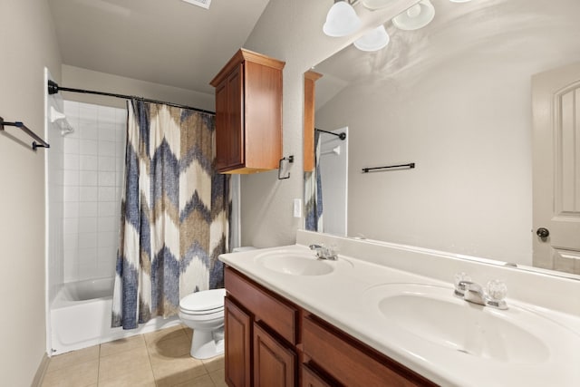 full bathroom with tile patterned flooring, vanity, shower / bath combo, and toilet