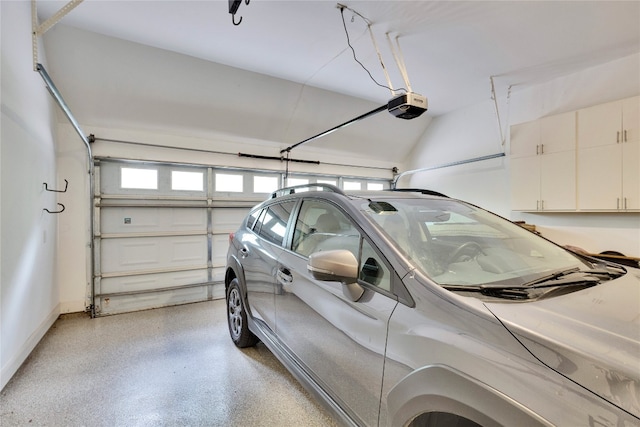 garage featuring a garage door opener