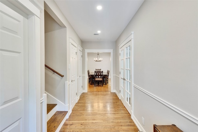 hallway featuring light wood-type flooring