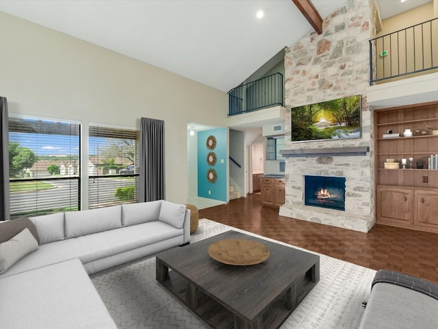 living room with high vaulted ceiling, beam ceiling, dark parquet floors, and a fireplace