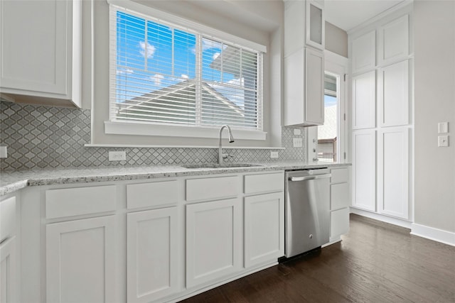 kitchen featuring dark wood-type flooring, white cabinets, sink, tasteful backsplash, and dishwasher