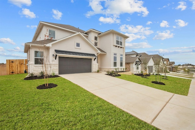 view of front of house with a garage and a front yard