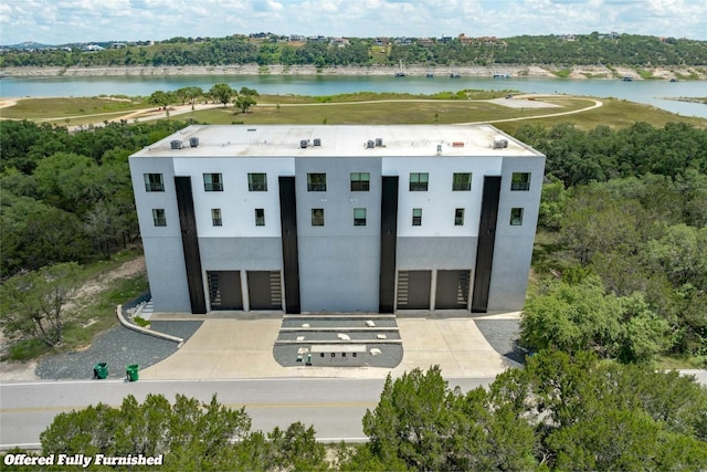 drone / aerial view featuring a water view