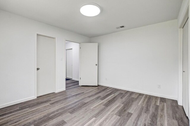 unfurnished bedroom featuring light hardwood / wood-style floors