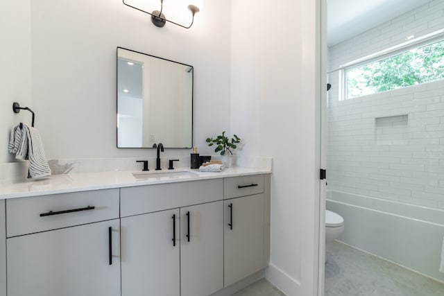 full bathroom featuring vanity, toilet, and tub / shower combination