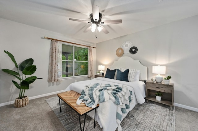 carpeted bedroom with baseboards and ceiling fan