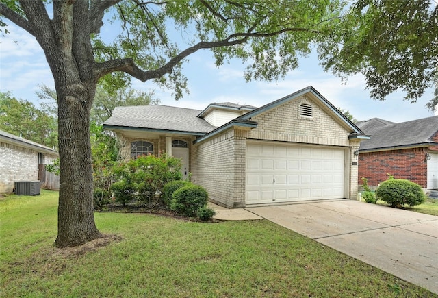 view of front of home with a front yard, central AC unit, driveway, a garage, and brick siding