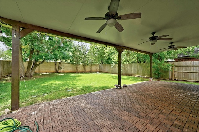 view of patio / terrace featuring a fenced backyard and a ceiling fan