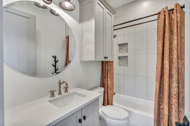 full bathroom featuring shower / bathtub combination with curtain, vanity, and toilet