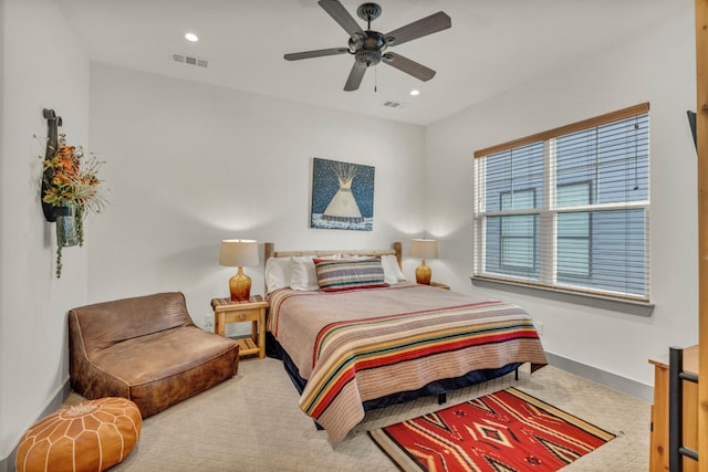 bedroom featuring ceiling fan and carpet floors