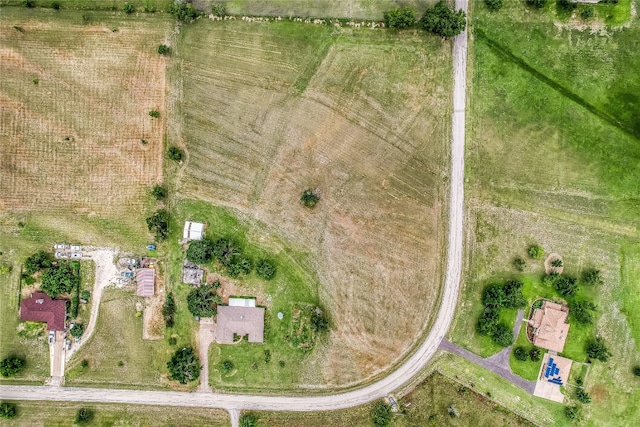 birds eye view of property featuring a rural view