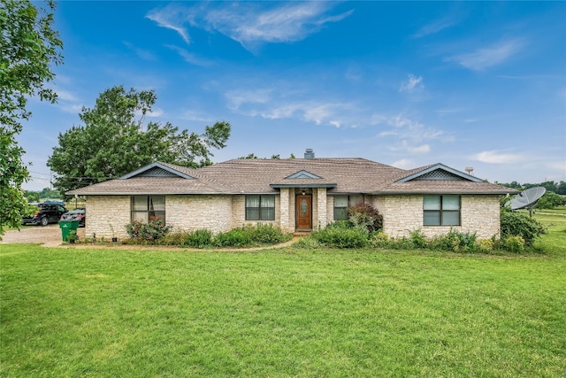 ranch-style house featuring a front yard