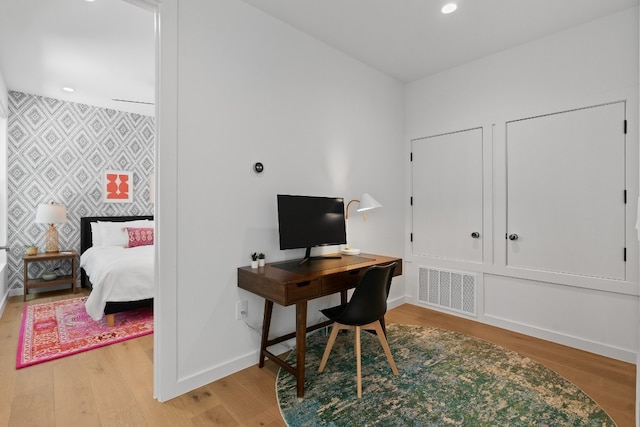 office space featuring light hardwood / wood-style floors